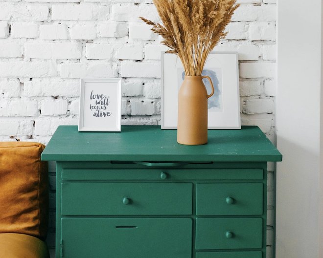 Wooden drawers with decorative items on top